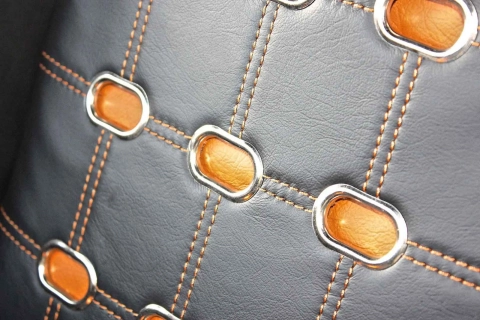 Black leather trim orange topstitching